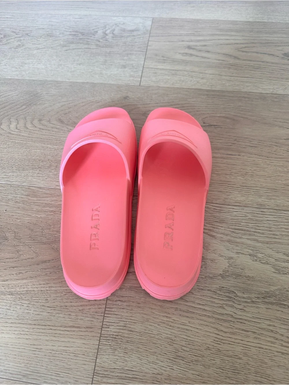 Prada triangle logo slides